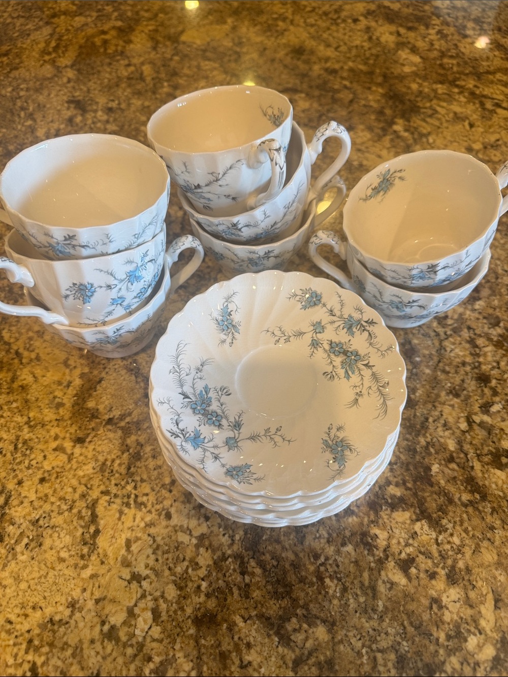 Set of eight vintage Myott “forget Me Not” tea cups and saucers.  England